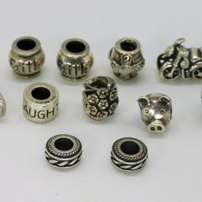 Sale Photo Thumbnail #234: 11 Sterling Charm Bracelet Spacers