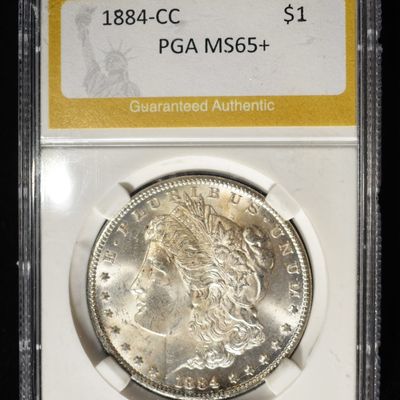 Sale Photo Thumbnail #231: 1884-CC MORGAN DOLLAR PGA GEM BU