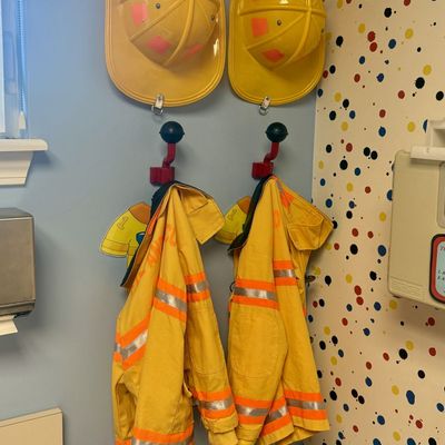 Sale Photo Thumbnail #143: A Pair of Child-Sized Firefighter Costume Jackets and Helmets