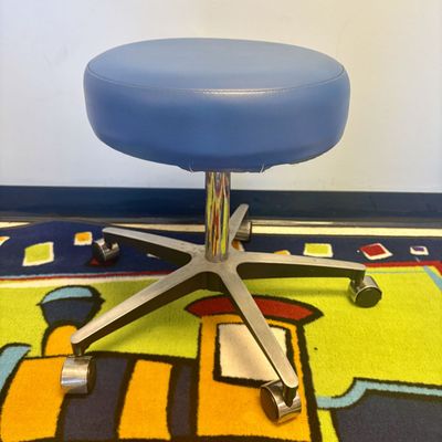 Sale Photo Thumbnail #163: Blue Vinyl Padded Pneumatic Medical Stool on Five-Point Rolling Base