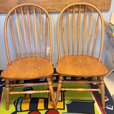 Sale Photo Thumbnail #150: A Pair of Richardson Brothers Solid Oak Windsor Style Hoop Back Side Chairs