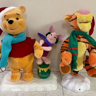 Sale Photo Thumbnail #412: A Pair of Disney Animated Holiday Plush Figures Featuring Winnie the Pooh, Piglet, and Tigger
