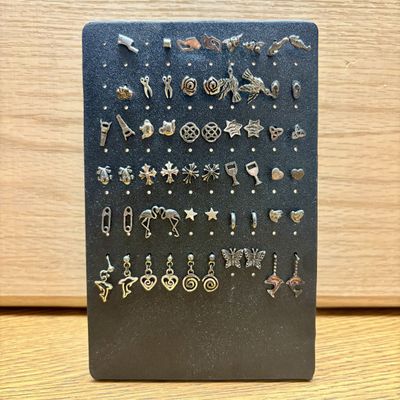 Sale Photo Thumbnail #333: A Collection of Sterling Base Stud and Dangle Earrings with Display Stand