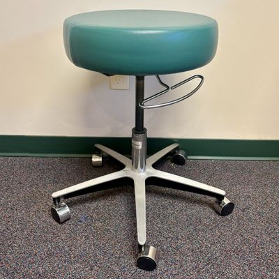 Sale Photo Thumbnail #130: The Brewer Company Teal Vinyl Medical Swivel Stool