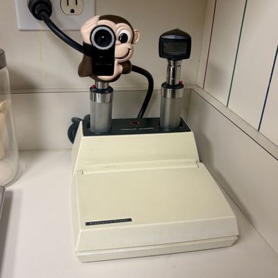 Sale Photo Thumbnail #194: Welch Allyn Diagnostic Set with Ophthalmoscope, Otoscope, and Exam Buddies Monkey Attachment