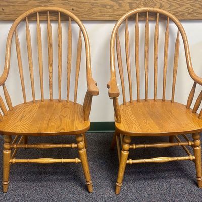 Sale Photo Thumbnail #113: A Pair of Richardson Brothers Company Solid Oak Windsor Style Armchairs