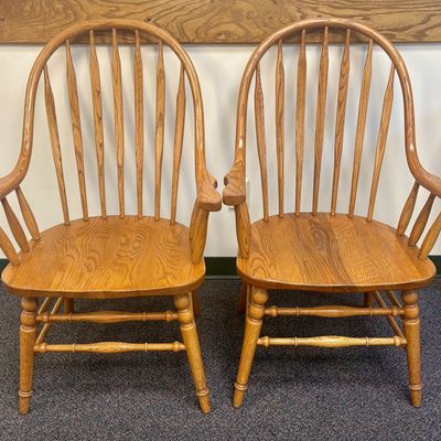 Sale Photo Thumbnail #168: A Pair of Richardson Brothers Company Solid Oak Windsor Armchairs