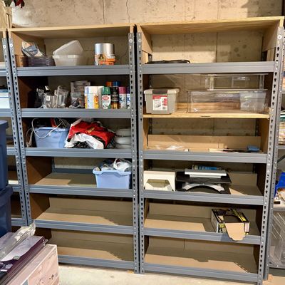 Sale Photo Thumbnail #344: A Pair of Gray Five-Tier Boltless Metal Shelving Units and Assorted Utility Supplies
