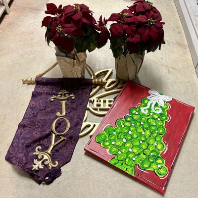 Sale Photo Thumbnail #337: A Collection of Christmas Holiday Decorative Wall Art and Artificial Poinsettias