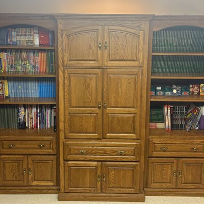 Sale Photo Thumbnail #285: A Three-Piece Traditional Oak Library Wall Unit with Integrated Entertainment Center Only