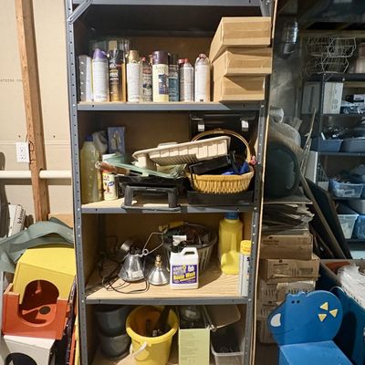 Sale Photo Thumbnail #405: A Metal Utility Shelving Unit with an Assortment of DIY and Household Goods