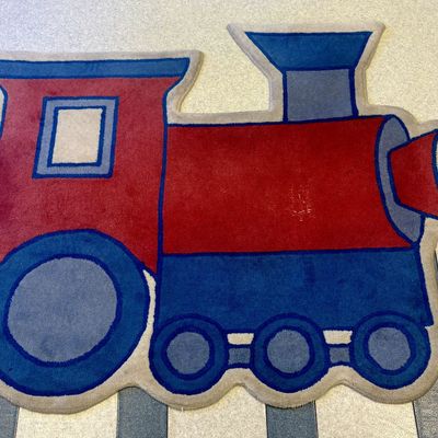 Sale Photo Thumbnail #154: A Novelty Shaped Steam Locomotive Play Rug