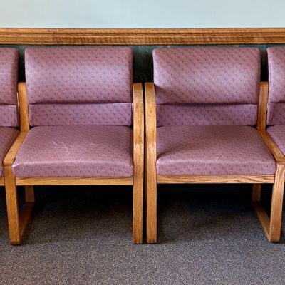 A Pair of Two-Seat Modular Oak Reception Benches with Sled Bases