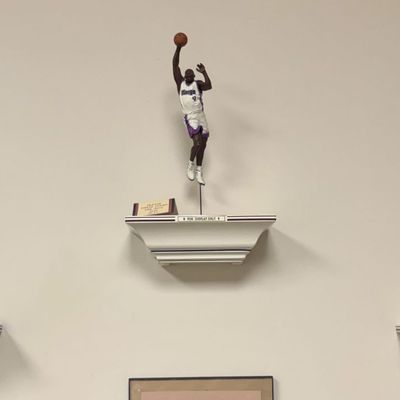 Sale Photo Thumbnail #186: Three Sports Action Figurines on Decorative Wall-Mounted Display Shelves