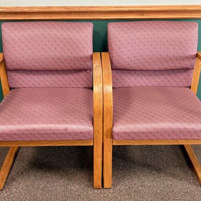 A Pair of Modernist Oak Sled Base Armchairs with Patterned Upholstery