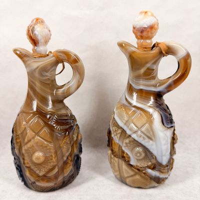 IMPERIAL PAIR OF CARAMEL SLAG GLASS CRUETS