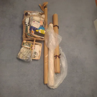 Baskets Of Sewing Goods And 3 Rolls Of Fabric