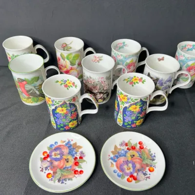 Collectible Coffee Cups And Small Plates