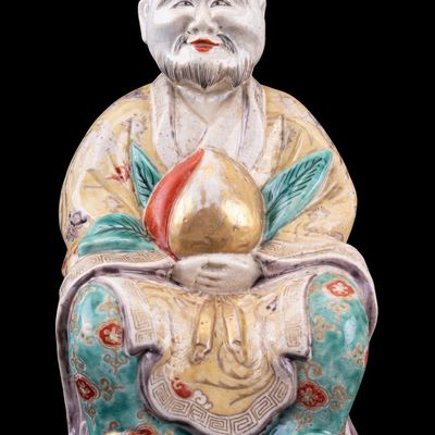 Sale Photo Thumbnail #98: Chinese Porcelain Figure of Immortal w/ Peach