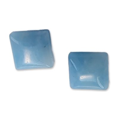A Pair of Light Blue Sugarloaf Chalcedony Cabochons