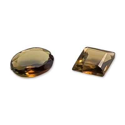 Sale Photo Thumbnail #321: Pair of Faceted Olive Green Quartz Gemstones
