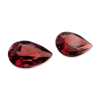 Sale Photo Thumbnail #124: Pair of Pear Cut Red Almandine Garnets