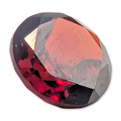 Sale Photo Thumbnail #113: Oval Faceted Red Garnet Gemstone