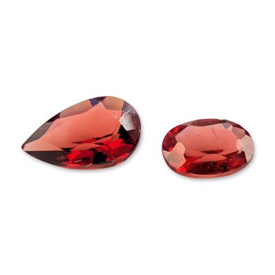 Sale Photo Thumbnail #122: Pair of Faceted Red Gemstones Pear and Oval