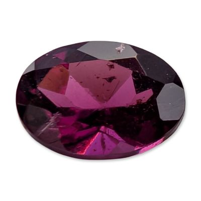 Sale Photo Thumbnail #127: Oval Mixed Cut Purplish Red Garnet Gemstone