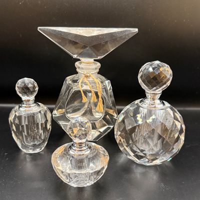 LOT 257: Collection of Cut Crystal Perfume Bottles by Oleg Cassini and More
