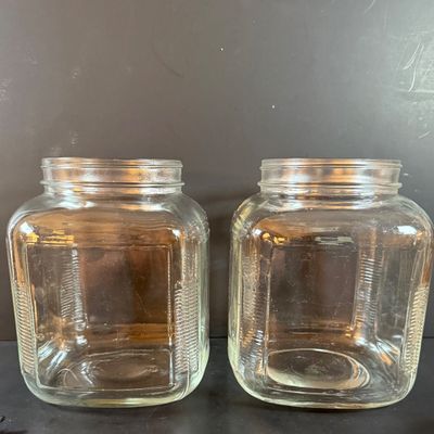 LOT 1: Vintage Large Wide Mouth Glass Jars, Cast Iron Match Dispenser, Cast Iron Pennsylvania Dutch Style Trivets and Cast Iron Hook
