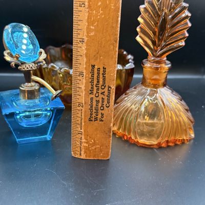 LOT 255: Amber Glass Perfume Bottler with Feather Fan Stopper, Blue Glass Cameo Perfume Atomizer and Amber Glass Bowl