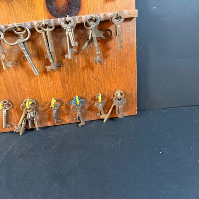 LOT 246: Large Collection of Keys on a Wooden Board and In a Wooden Box
