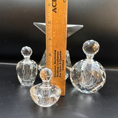 LOT 257: Collection of Cut Crystal Perfume Bottles by Oleg Cassini and More