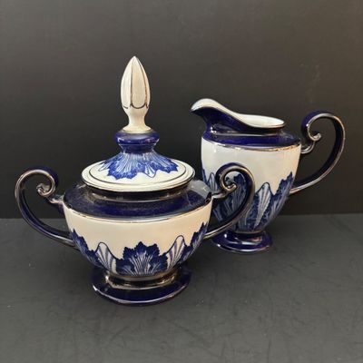 LOT 97: Bombay & Company Arabesque Cobalt Blue & White Teapot, Sugar Bowl, Creamer
