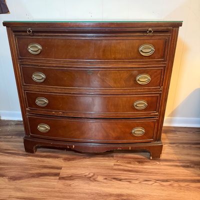 LOT 182: Bowed Front Chest of Drawers with Pull-Out Slide and Oval Hardware and Removable Glass Top