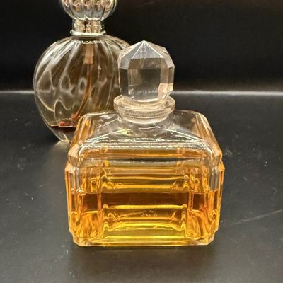 LOT 258: Collection of Designer Perfume and Perfume Bottles Including Givenchy, Guerlain and More