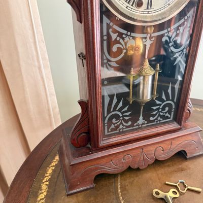 Lot 169: Antique Wooden Parlor Mantel Clock with Keys and Pendulum