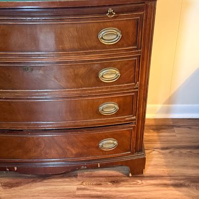 LOT 182: Bowed Front Chest of Drawers with Pull-Out Slide and Oval Hardware and Removable Glass Top