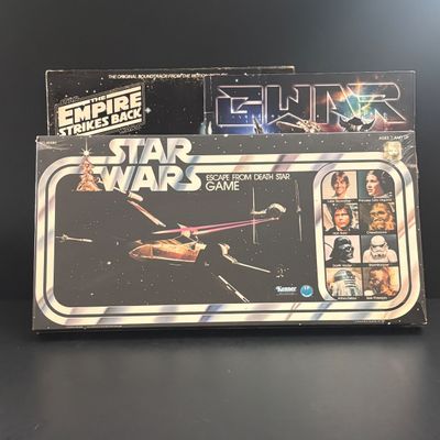 LOT 101: Vintage Unopened Kenner Star Wars Board Game, The Empire Strikes Back LP Soundtrack & Gwar Lust in Space Program Booklet