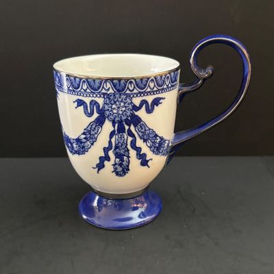 LOT 98: Vintage Bombay & Co. Cobalt Blue & White Footed Coffee Pot, "Grace" Mug, Porcelain Handle Serving Pieces &...