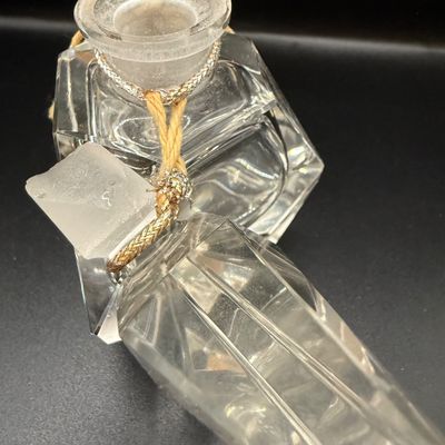 LOT 257: Collection of Cut Crystal Perfume Bottles by Oleg Cassini and More