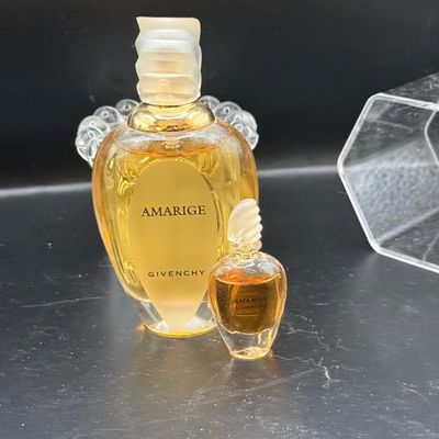 LOT 258: Collection of Designer Perfume and Perfume Bottles Including Givenchy, Guerlain and More