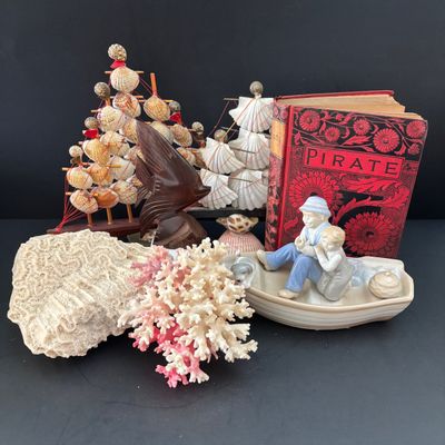 LOT 108: Nautical Collection of Seashell Ships, Meico Paul Sebastian "Fishing w/Grandfather" Porcelain Figurine, Large Corals...