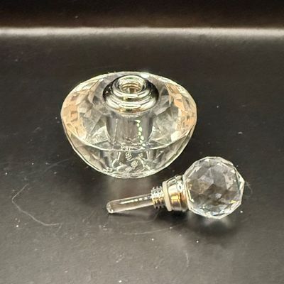 LOT 257: Collection of Cut Crystal Perfume Bottles by Oleg Cassini and More