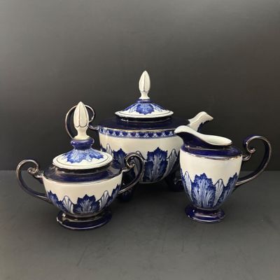 LOT 97: Bombay & Company Arabesque Cobalt Blue & White Teapot, Sugar Bowl, Creamer