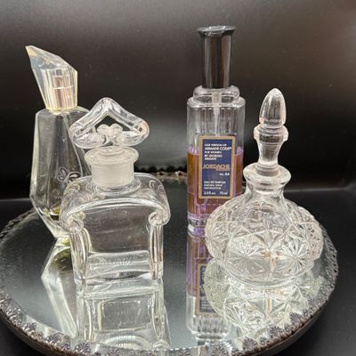 LOT 254: Mirrored Vanity Tray with Perfume Bottles Including Jordache Perfume by Armani and Guerlain Baccarat Bottle and More