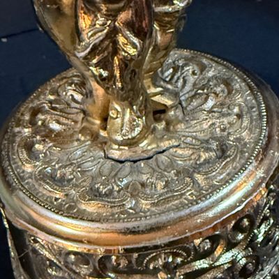 LOT 251: Collection of Desk Lighters Featuring an Antique Cherub Music Box Ligher and More