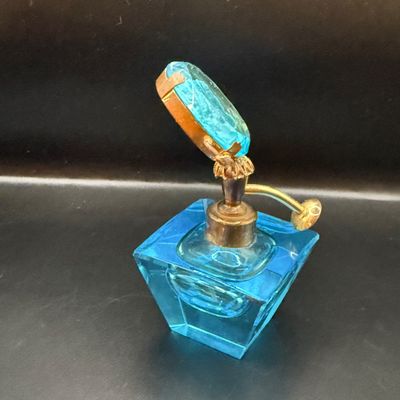 LOT 255: Amber Glass Perfume Bottler with Feather Fan Stopper, Blue Glass Cameo Perfume Atomizer and Amber Glass Bowl