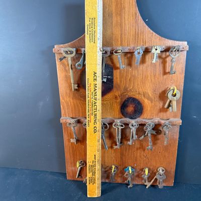 LOT 246: Large Collection of Keys on a Wooden Board and In a Wooden Box